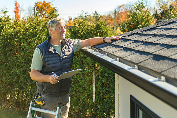 Professional Hail Damage Roof Repair technician working in Hanford, CA